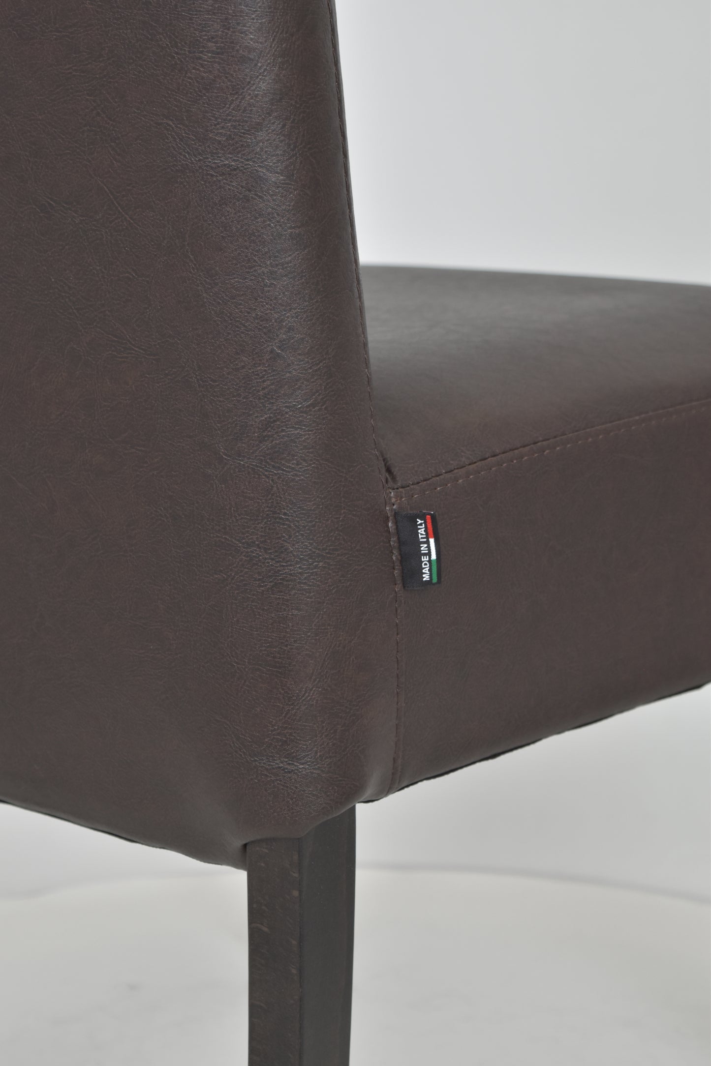 Stock second choice chair model 36 upholstered in dark brown artificial leather