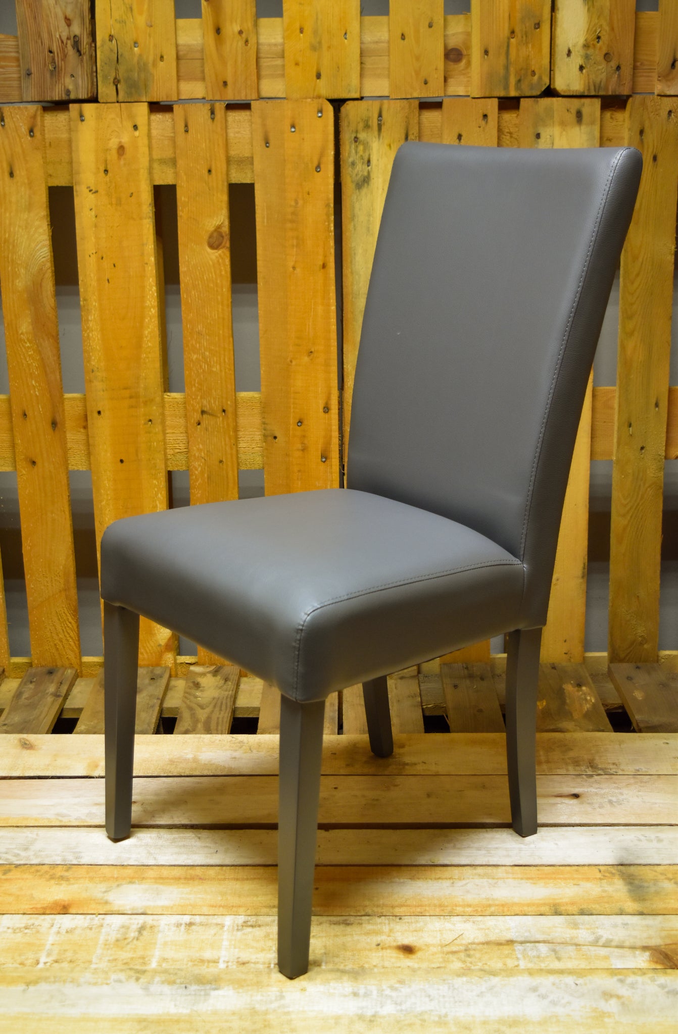 Stock second choice chair model 46 upholstered in dark grey artificial leather