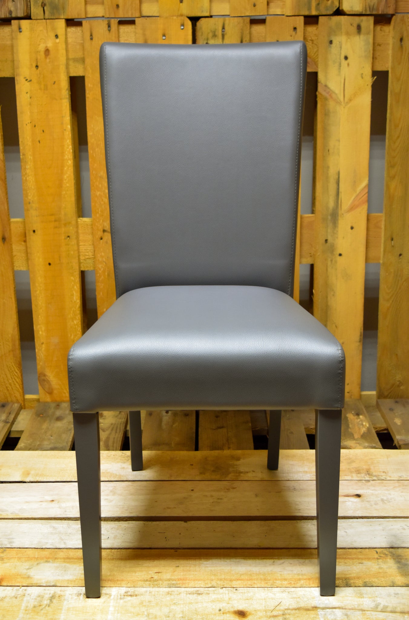 Stock second choice chair model 46 upholstered in dark grey artificial leather