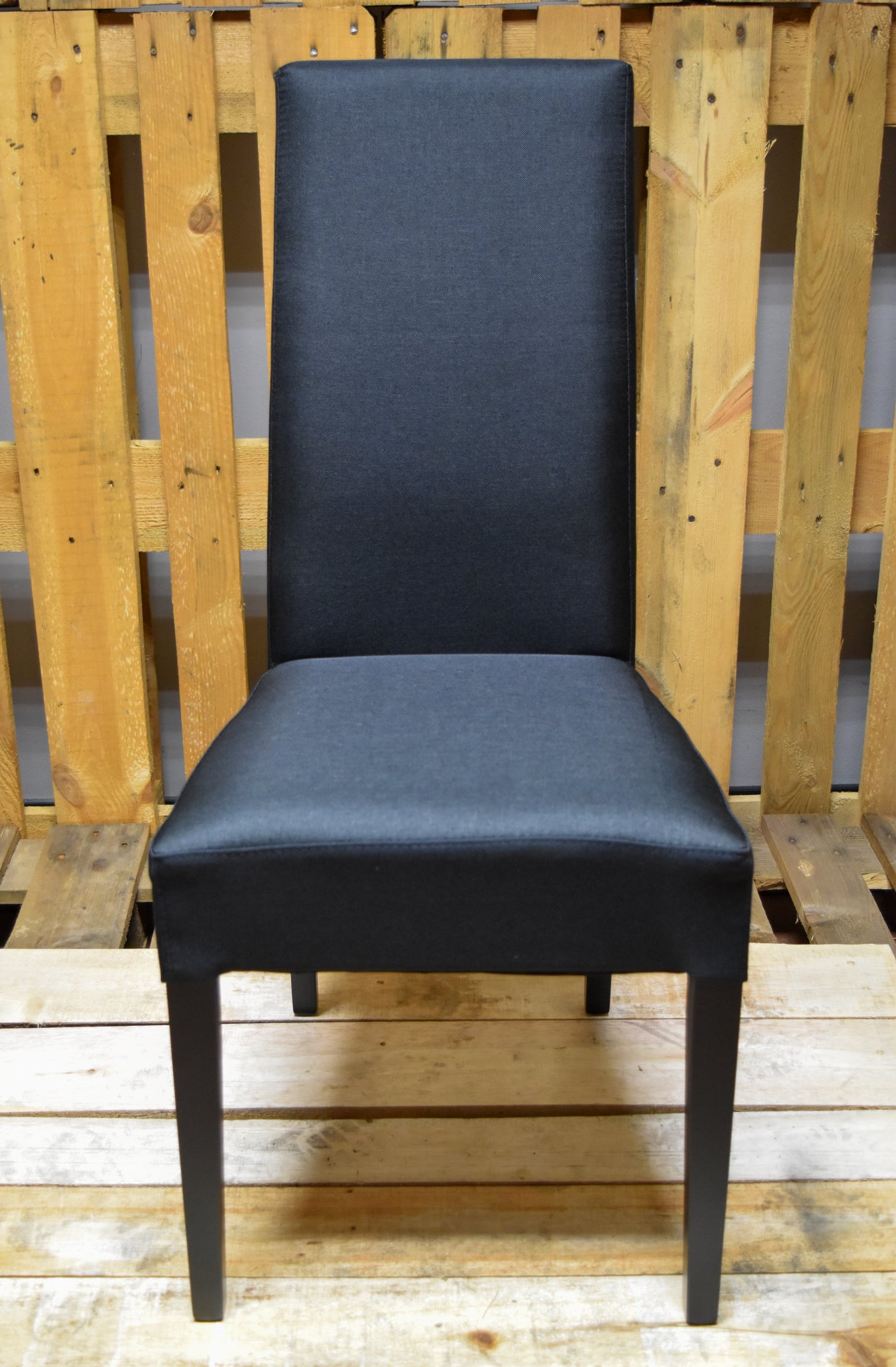 Stock model 36 chairs upholstered in black fabric