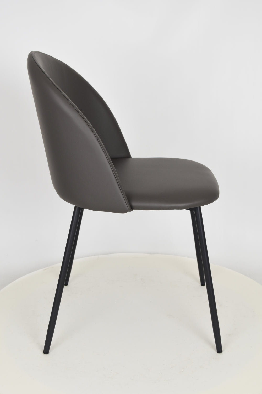 Outlet chair model 99 upholstered in antrachite artificial leather