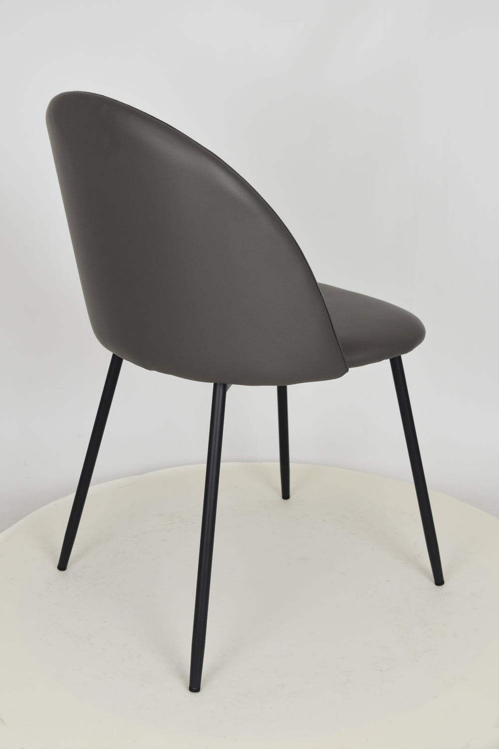 Outlet chair model 99 upholstered in antrachite artificial leather
