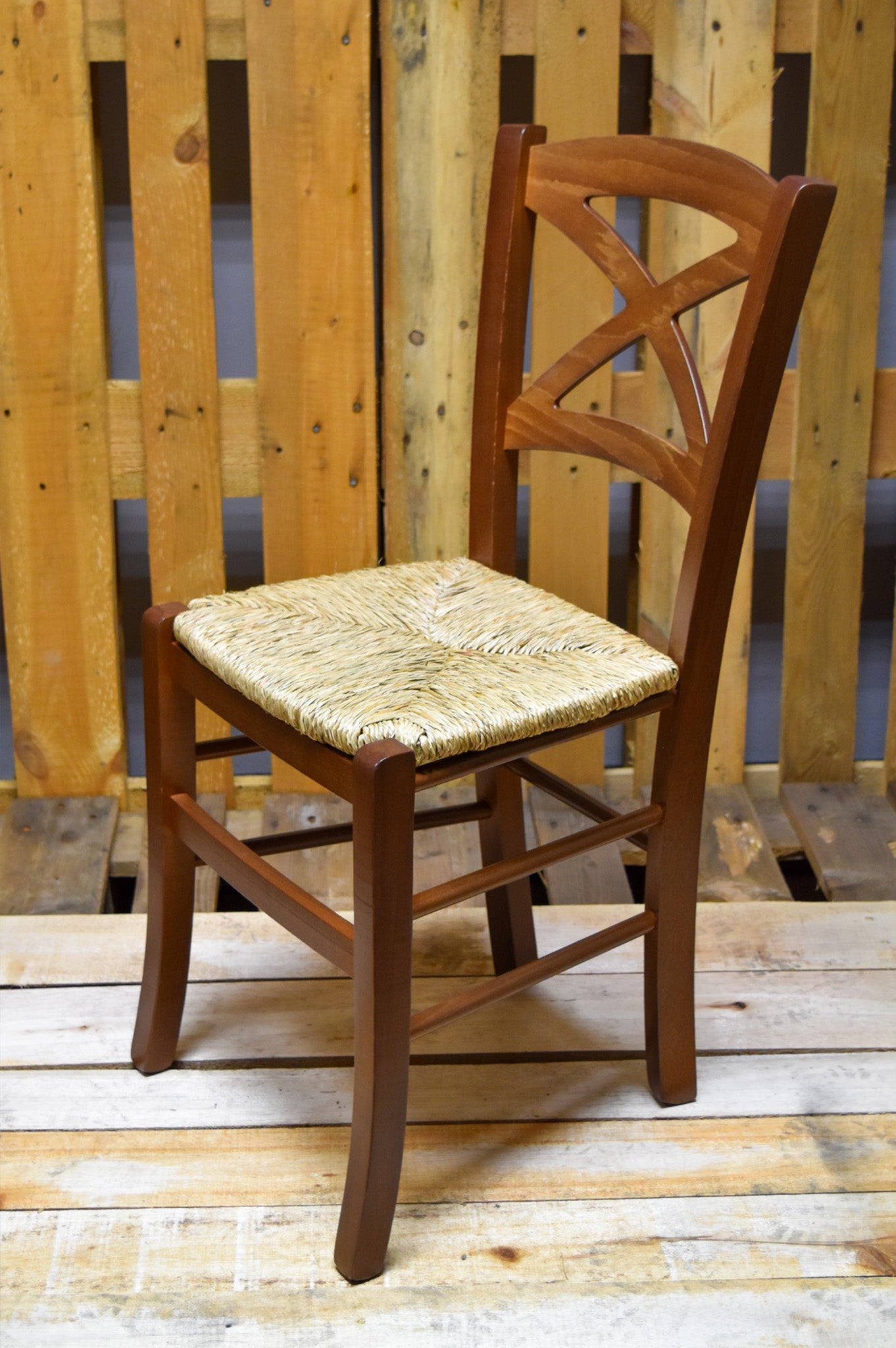 Stock second choice chair model 33 in nut color straw seat