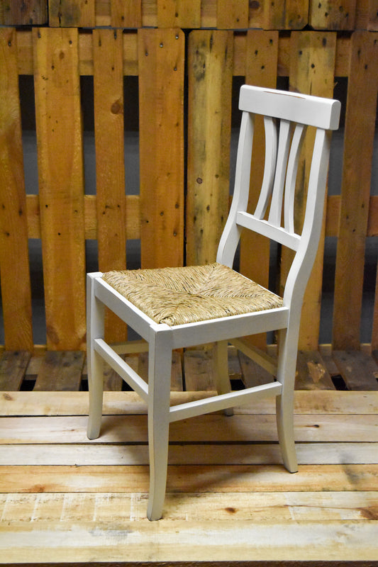 Stock chairs model 16/11 in antique white with straw seat