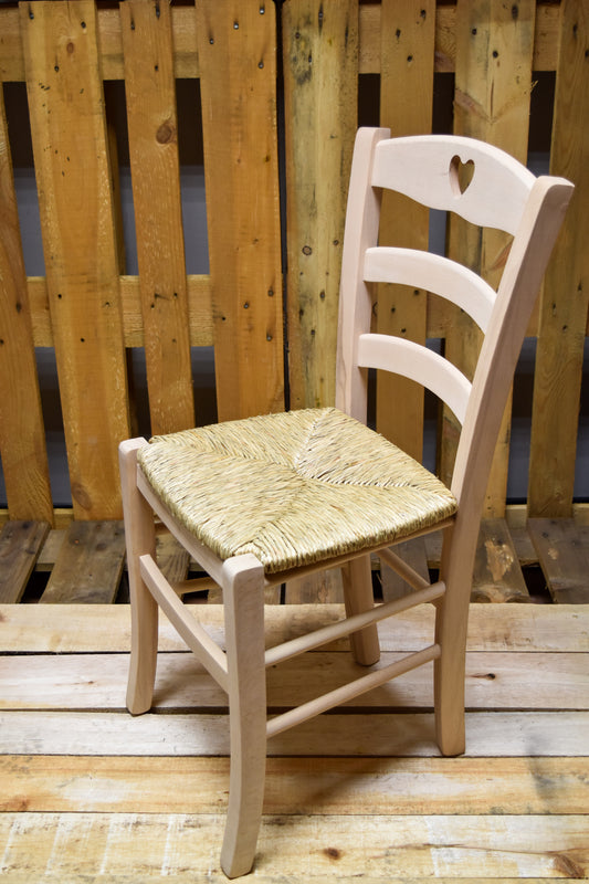 Stock model 25 chairs with raw straw seat