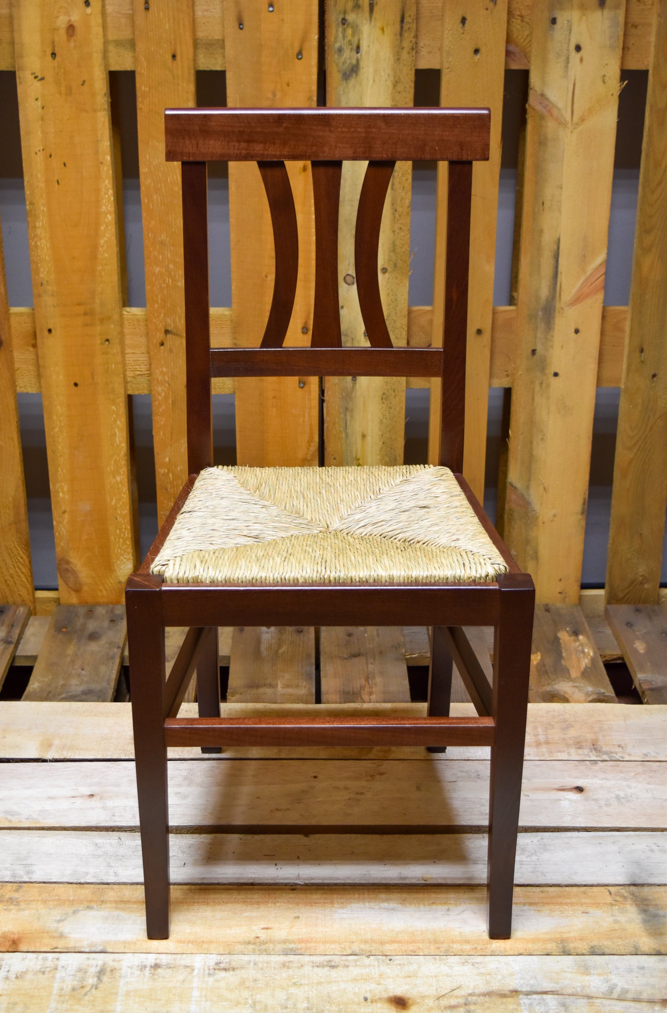 Stock chairs model 16/11, dark walnut color, straw seat