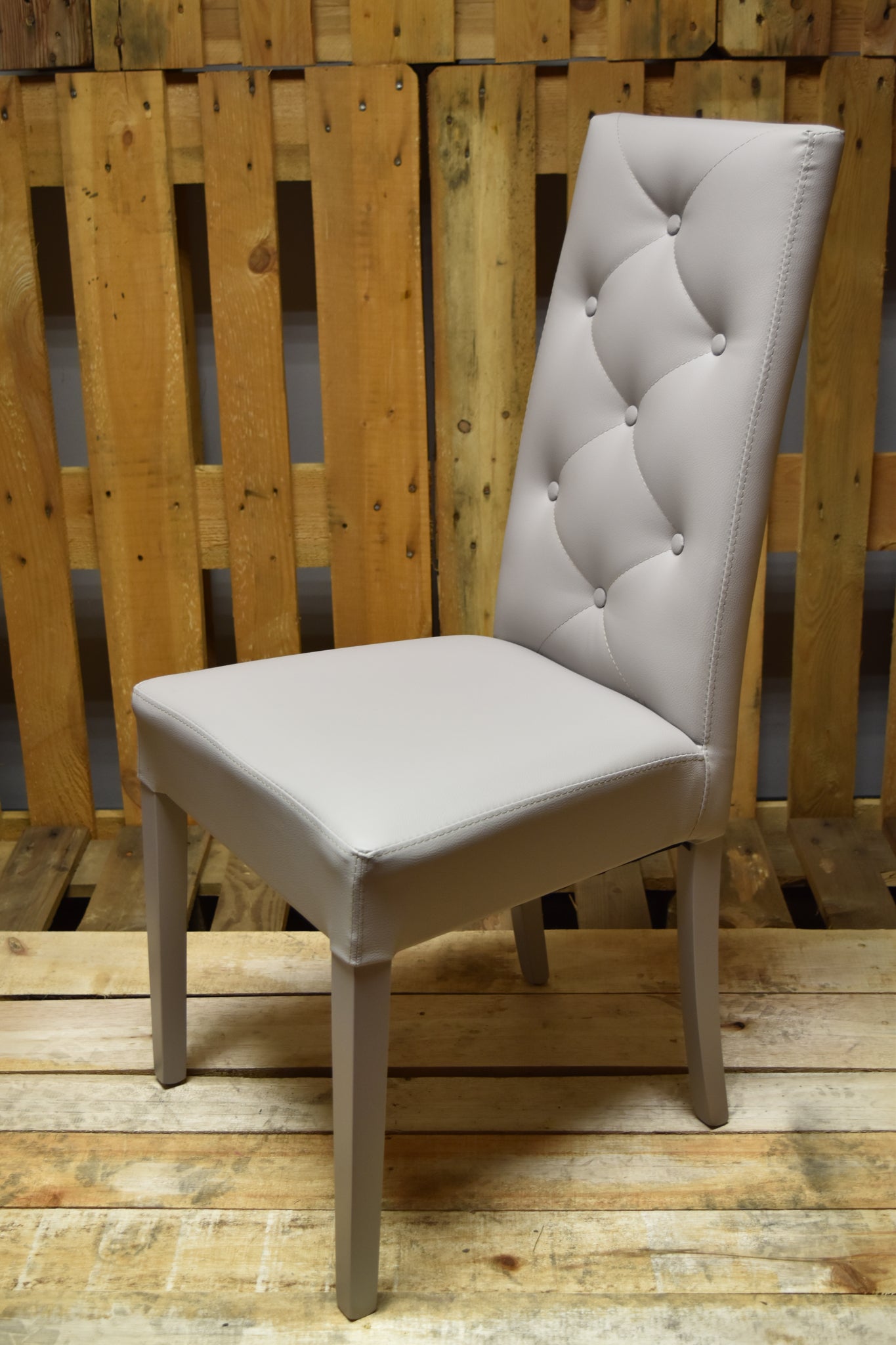 Stock model 35 padded chairs in light grey