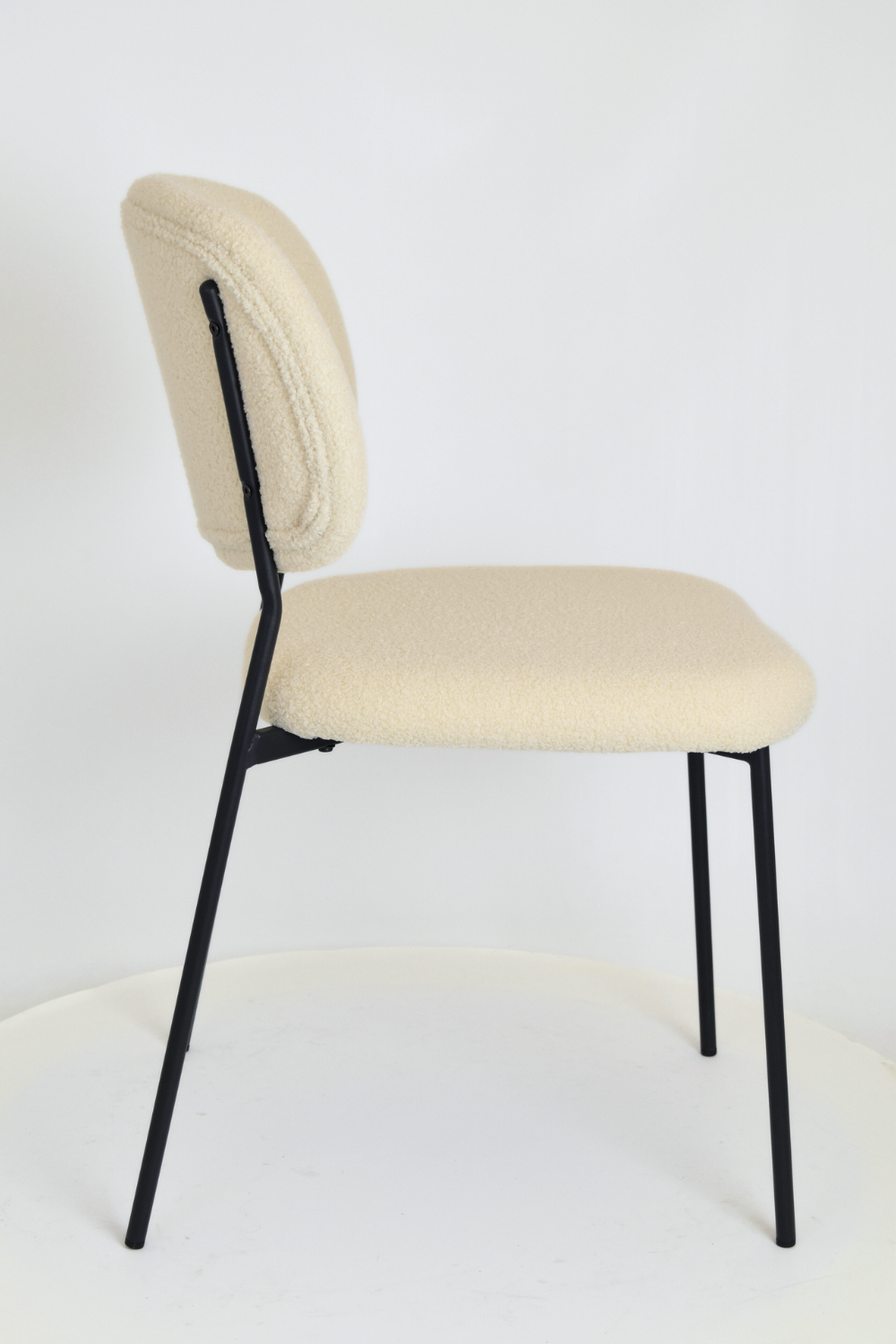 Outlet chair model 97 upholstered in beige bouclé fabric